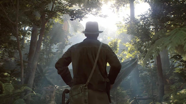 Indiana Jones blickt von der Kamera abgewandt in einer Dschungelkulisse, Indian Jones und der Große Kreis